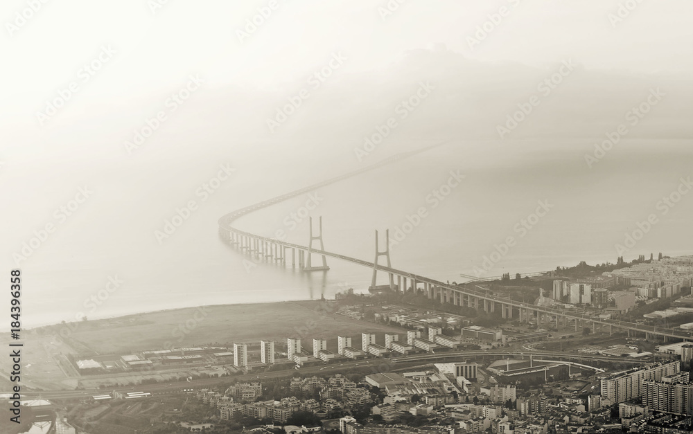 Aerial view of the bridge Vasco da Gama in Lisbon. Black and white image.