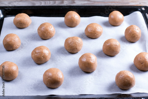 Tray of balls of dough for baking biscuit