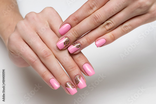 pink manicure with gold design on long square nails    