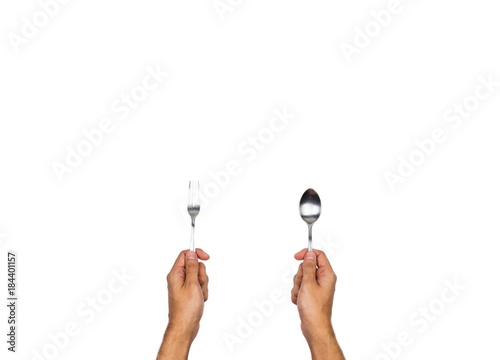 Spoon and fork hand holding isolated on white background, top view angle