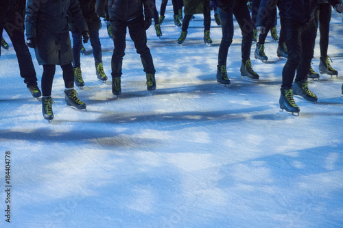 People ice skating. cropped image showing peoples legs