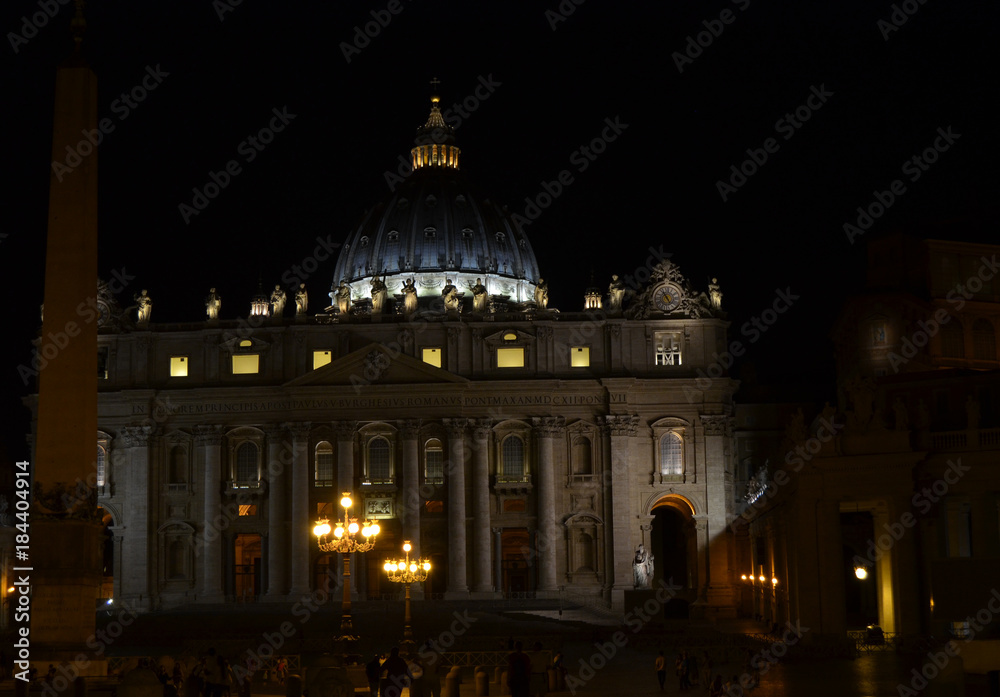 Rome Italy . August 14, 2014 at 22:30. Night view of the Basilica of San Pietro, on the left the Vatican obelisk.