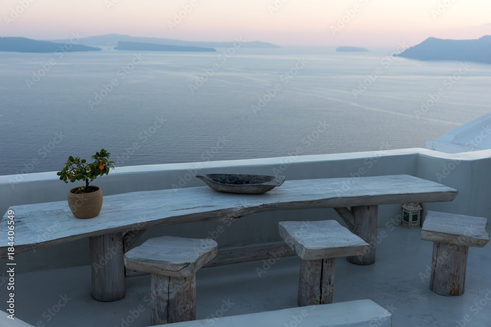 Fototapeta premium Terrace with view of the Mediterranean Sea in Oia, Santorini