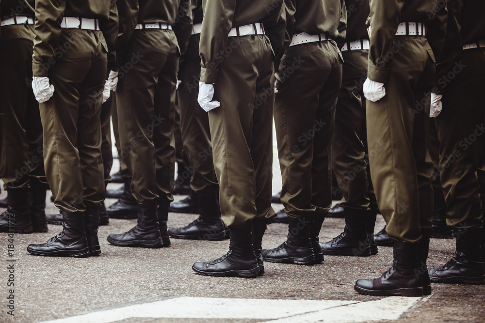 military men in green dress uniform stand at attention military men in green dress uniform stand at attention