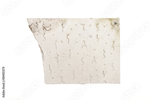 dirty ceiling board asbestos isolated on the white background. photo