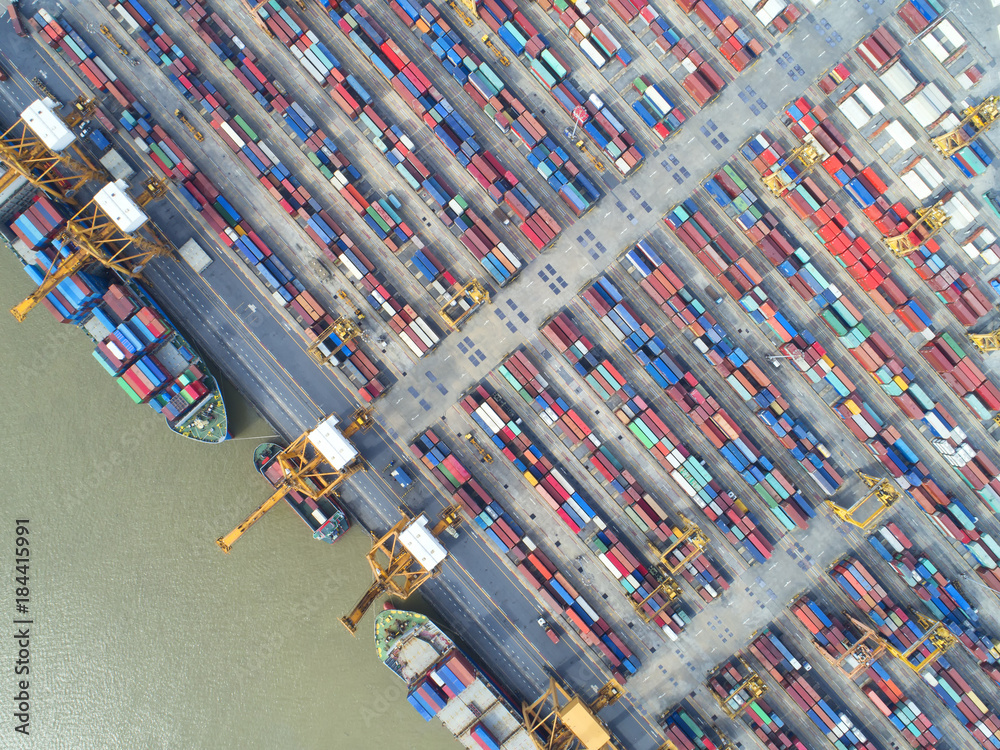 Obraz premium container,container ship in import export and business logistic,By crane,Trade Port , Shipping,cargo to harbor.Aerial view,Water transport,International,Shell Marine,transportation,logistic,trade,port