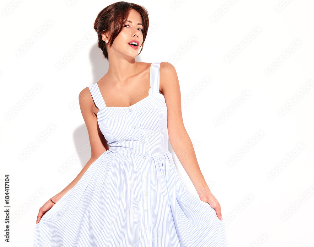 Portrait of beautiful cute brunette woman model in casual summer dress with no makeup isolated on white Portrait of beautiful cute brunette woman model in casual summer dress with no makeup isolated on white