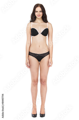 Full portrait of sexy lady in black lingerie, isolated on white background