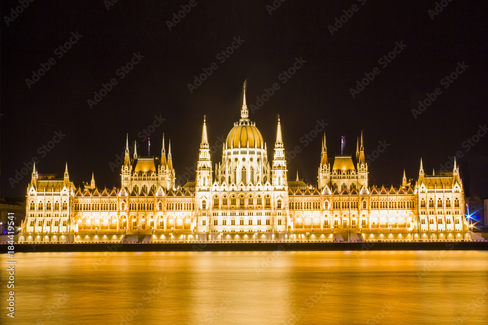Beautiful view of the Hungarian Parliament building on the Danube embankment in Budapest, Hungary