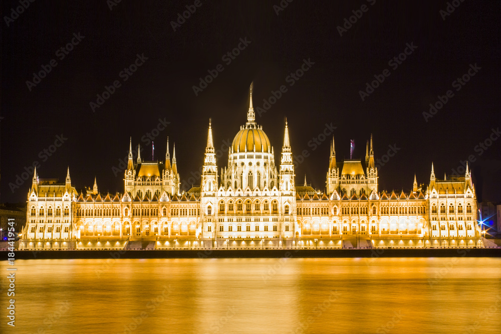 Fototapeta premium Beautiful view of the Hungarian Parliament building on the Danube embankment in Budapest, Hungary