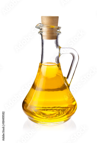 Decanter with farm organic vegetable oil, isolated on white