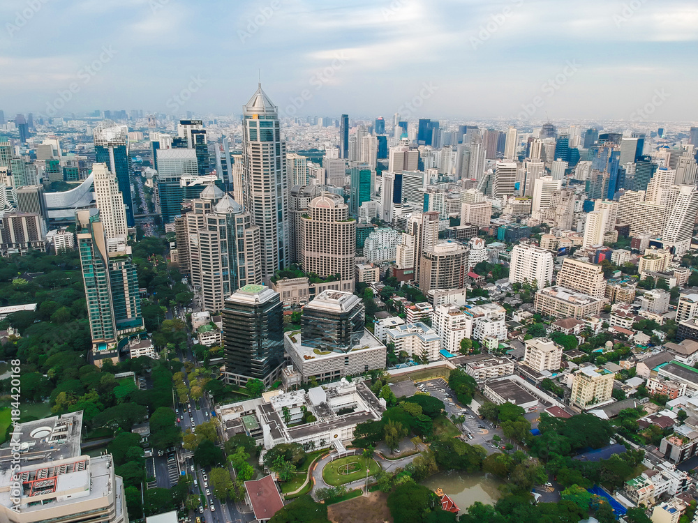 Bangkok skyline with green park sunset