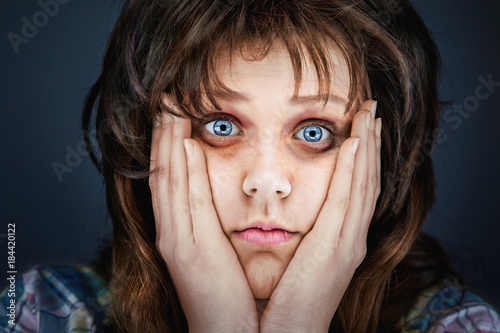 Anxious and tired face of an ill woman. photo