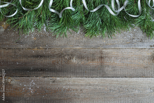Christmas card on wooden background photo