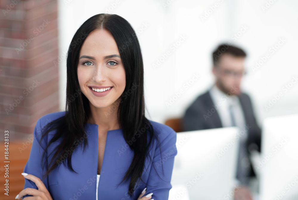 Successful young business woman with charming confident smile Successful young business woman with charming confident smile