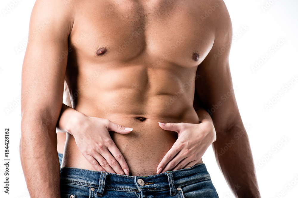 midsection image of man torso with female hands isolated on white