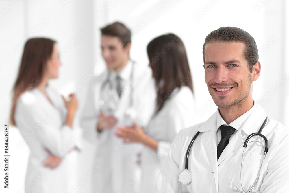 smiling doctor therapist on blurred background. smiling doctor therapist on blurred background.