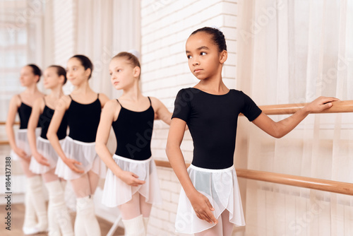 Young ballerinas rehearsing in the ballet class. © VadimGuzhva