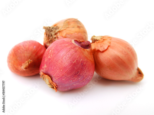 Red onion tuber isolated on white background