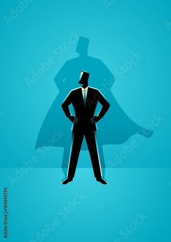 Businessman with superhero shadow