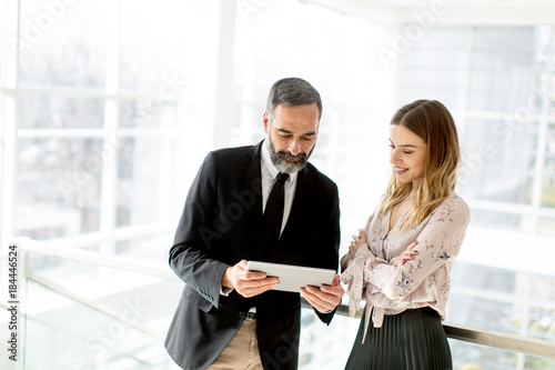 Business couple with digita...