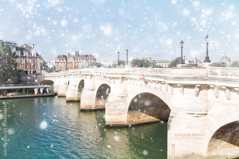 Pont Neuf and river Seine waters under snow, Paris, France