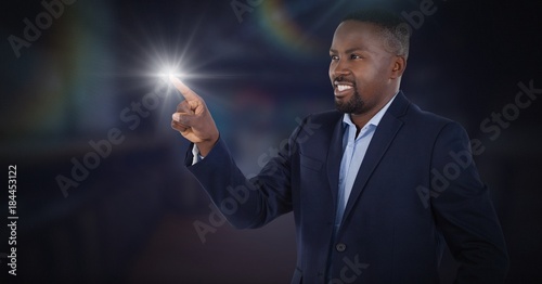 Businessman touching air glow photo