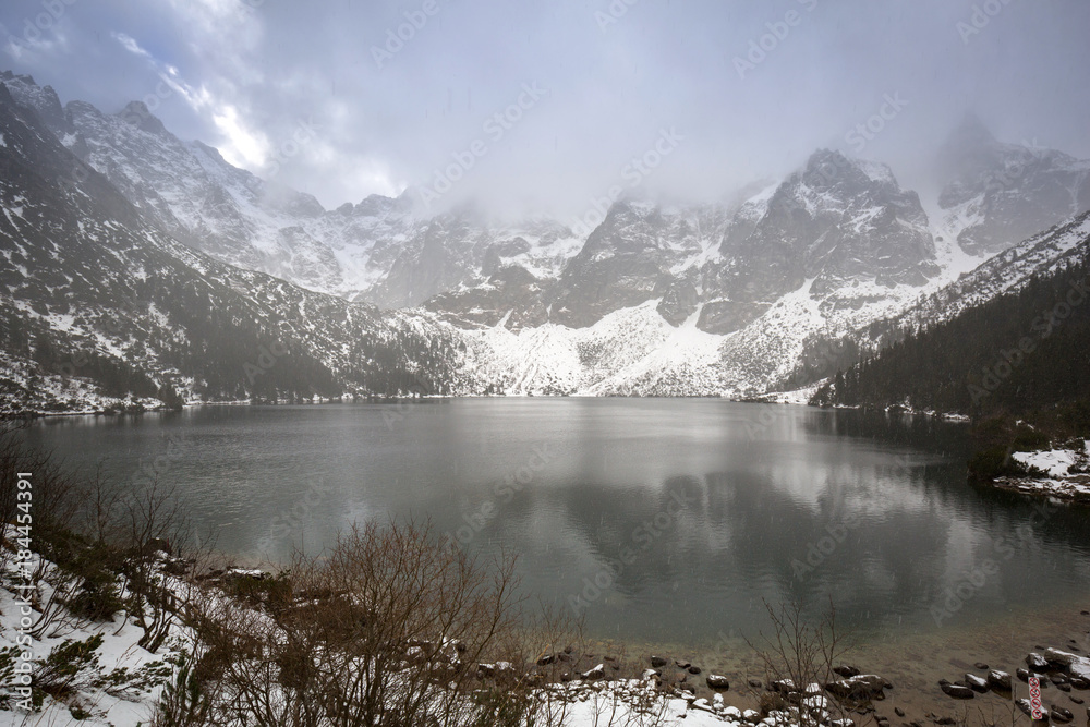 Beautiful winter at Eye of the Sea lake in in Tatra mountains, Poland