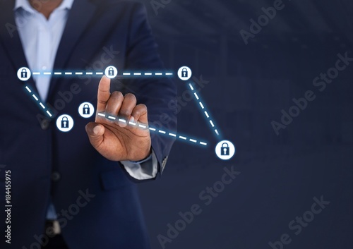 Businessman touching security lock icons connecting