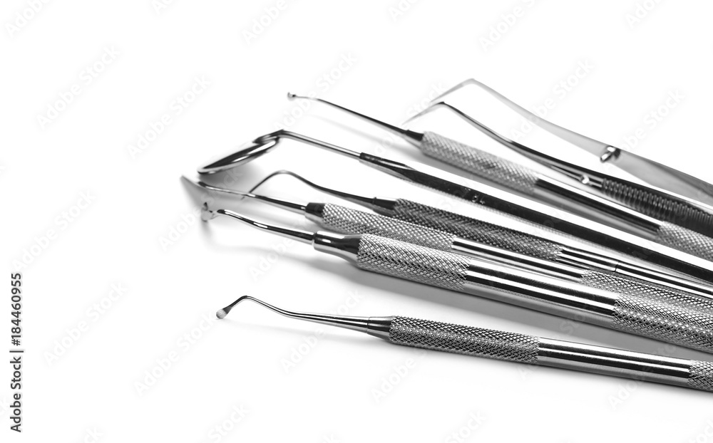Set of medical equipment tools for teeth dental care isolated on white Set of medical equipment tools for teeth dental care isolated on white
