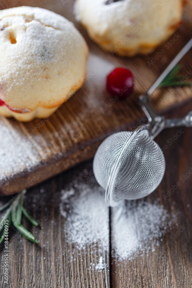 Fototapeta premium Muffins with cranberries and chocolate