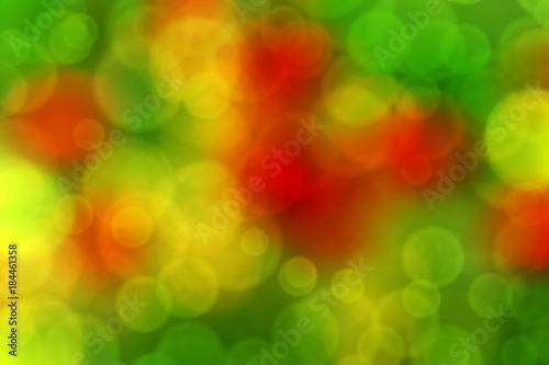 blurry abstract background with bokeh effect, poppies in the grass