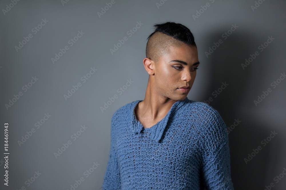 Confident transgender woman looking away Confident transgender woman looking away