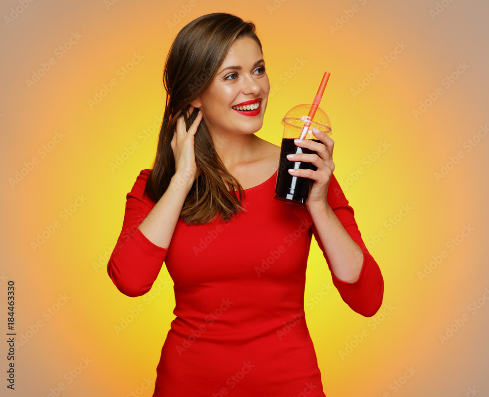 Smiling woman holding cola glass. Smiling woman holding cola glass.