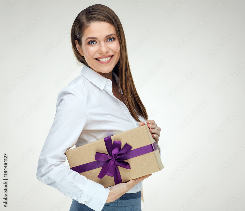 Businesswoman holding big gift box. Isolated portrait Businesswoman holding big gift box. Isolated portrait