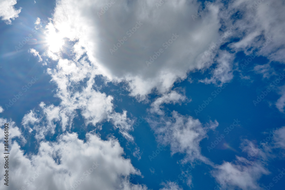 Obraz premium Blue sky with clouds and sun