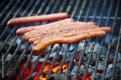 Grilling viennese sausages. Close-up shot