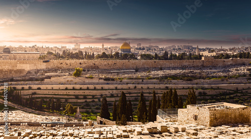Mount of Olives and the old Jewish cemetery in Jerusalem, Israel. Panoramic view of the old town, Muslim Quarter and Temple Mount. Dome of the Rock.