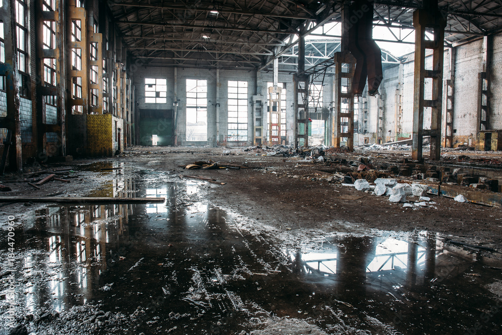 Abandoned industrial creepy warehouse, old dark grunge factory building Abandoned industrial creepy warehouse, old dark grunge factory building