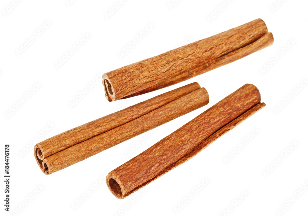 Three cinnamon sticks isolated on a white background Three cinnamon sticks isolated on a white background