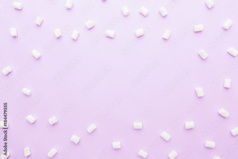 Marshmallows frame on pink background Top view Marshmallows frame on pink background Top view