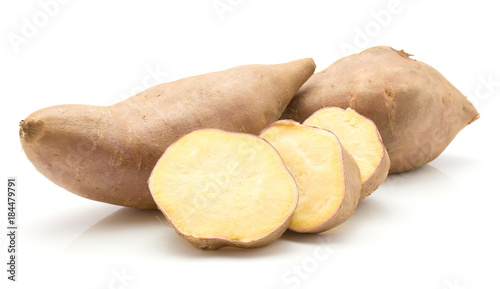 Two sweet potato and three slices isolated on white background.