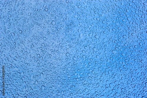 Many water drops on glass