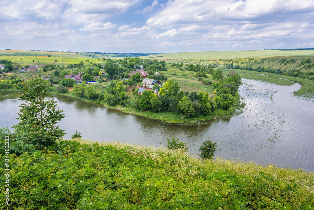 Aerial view of Zhvanchyk River, tributary of the Dniester from castle ruins in Zhvanets town, Ukraine