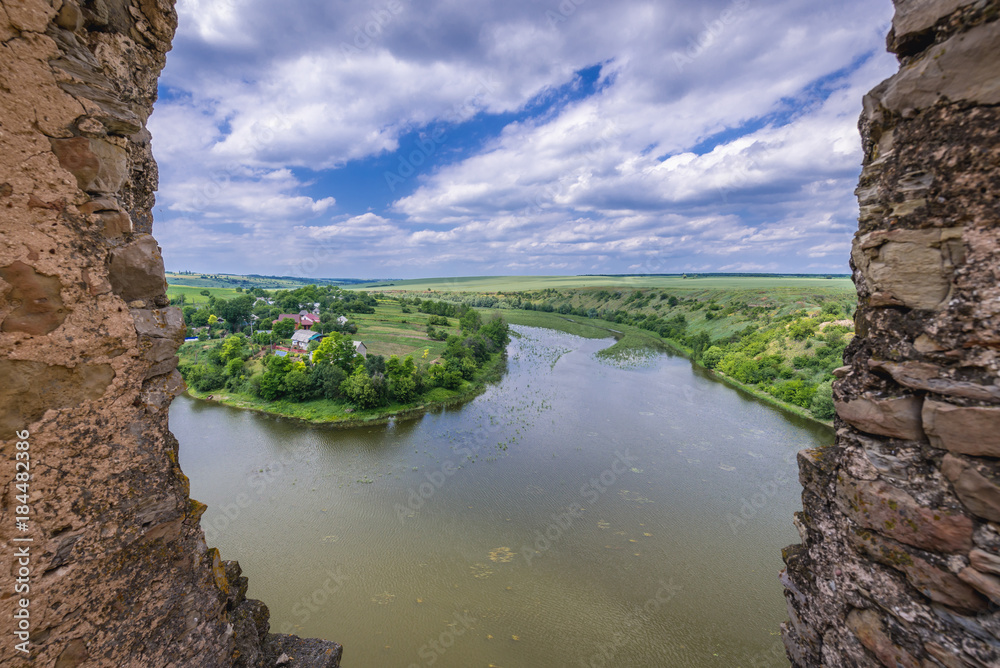 Fototapeta premium Aerial view of Zhvanchyk River, tributary of the Dniester from castle ruins in Zhvanets town, Ukraine