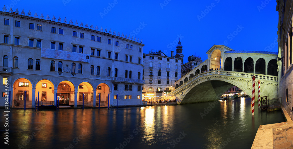 Venice, Italy - June 06, 2017.: Tourists visit in Venice Rialto bridge at night, Venice, Italy