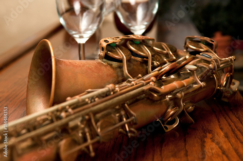 Canvas Print Cropped Shot of Saxophone and Wine Glasses