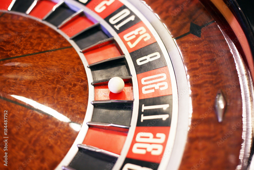 casino roulette, ball on red. The concept of gambling in roulette casino roulette, ball on red. The concept of gambling in roulette