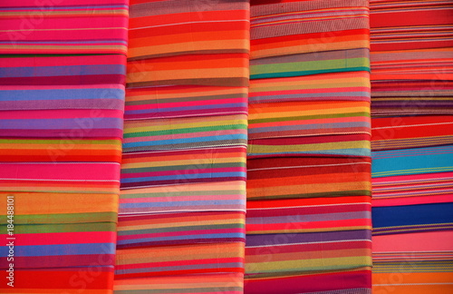 Colorful material for sale at the art and craft market of Fenghuang