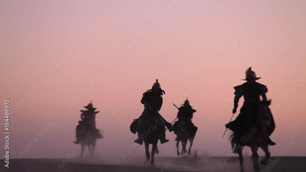 Horsemen warriors silhouetted, Medieval Cavalry attacks the Enemy